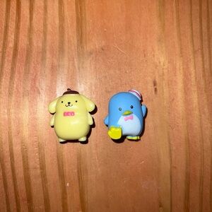 New in bags sanrio Pompompurin and Tuxedo Sam figures